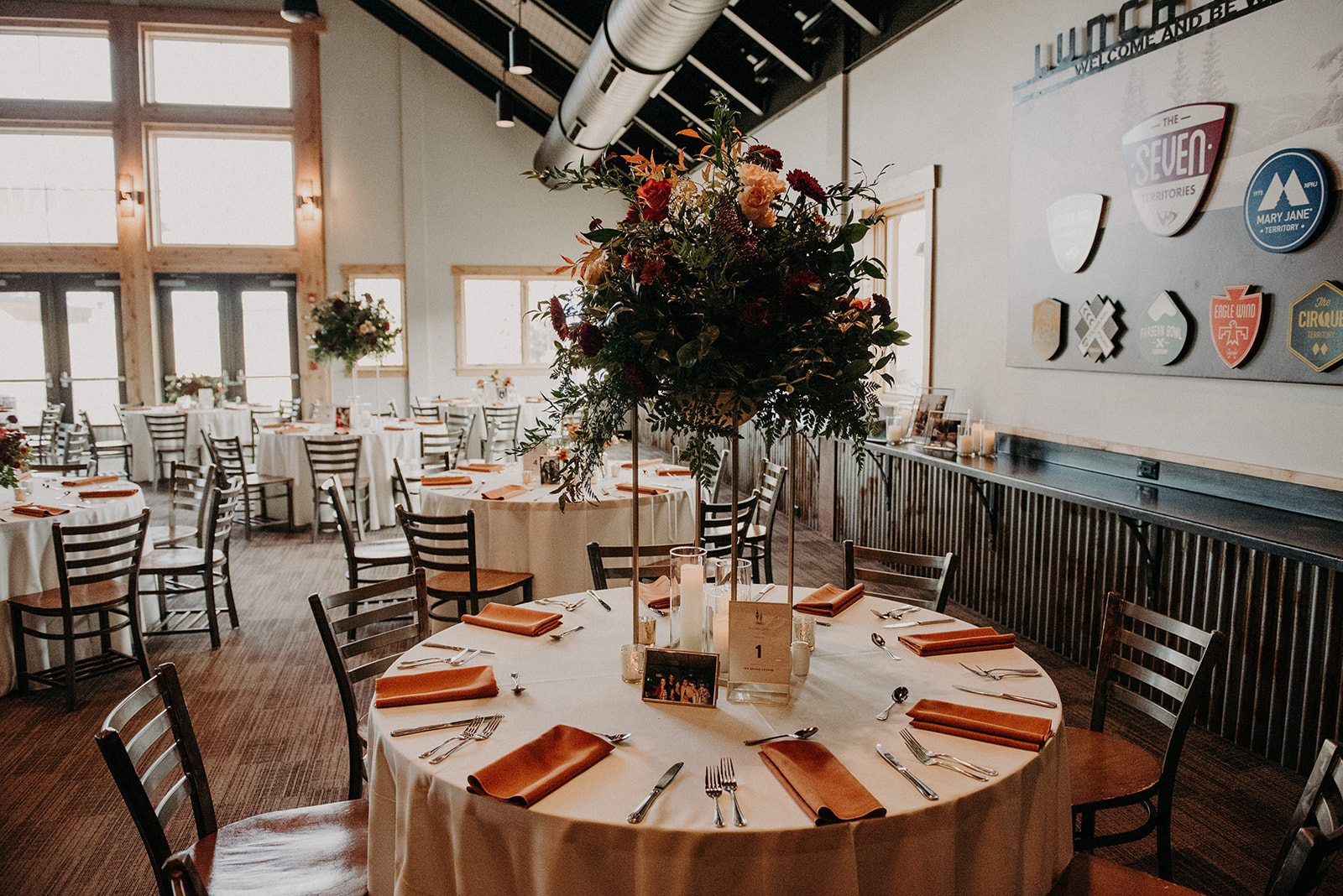 Lunch Rock reception venue with tall floral centerpeice