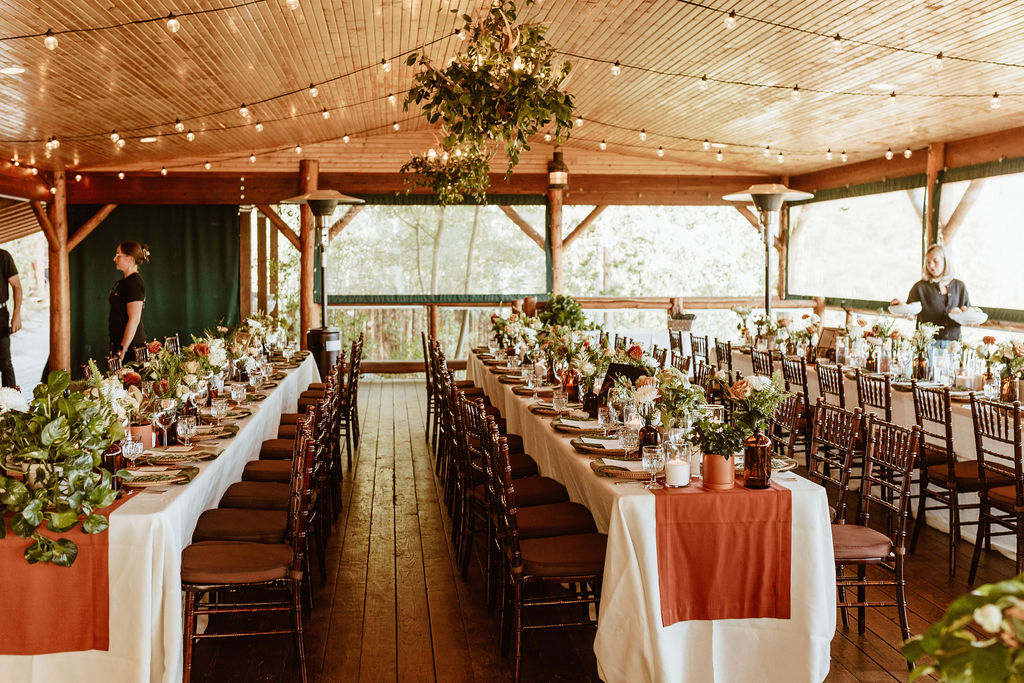 Boho wedding decor with plants in Grand Lake Lodge pavilion